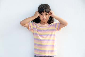 Portrait of preschooler girl having a headache