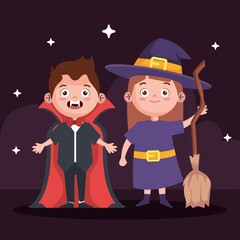 boy with vampire and girl with witch costume