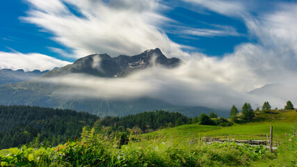 Fototapeta na wymiar Mountain landscape with blurred clouds