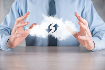 Cloud technology. Polygonal wireframe cloud storage sign with two arrows up and down on dark ....