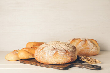 Different fresh bread on table