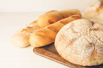 Different fresh bread on table