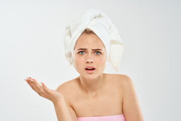 beautiful woman with a towel on my head acne on the face hygiene