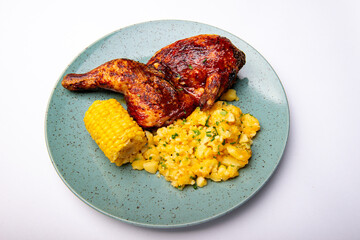 TEXAS CHICKEN 
Half a chicken marinated in Texas 
BBQ and then grilled to perfection. Served with squeezed cheddar potatoes and corn.