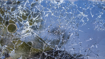 Broken smartphone. Mobile phone with a broken camera. Broken back cover of smartphone