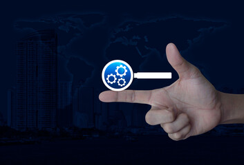 seo flat icon on finger over world map, modern city tower and skyscraper, Technology search engine optimization concept, Elements of this image furnished by NASA