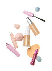 Set of makeup cosmetics and sponges on white background