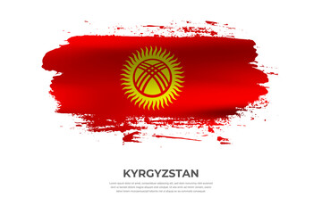 Artistic folded brush flag of Kyrgyzstan. Paint smears brush stroke flag on isolated white background