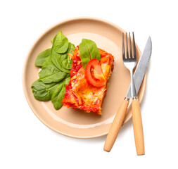 Plate with piece of tasty tomato lasagna on white background