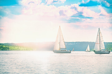 Fototapeta premium Sailing yacht in a calm sea and an incredible sunset.