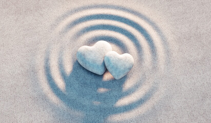 Zwei Herzen aus Stein in Sandwellen - obrazy, fototapety, plakaty