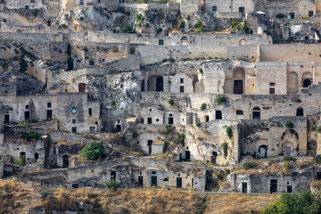 Panoramic view of Sassi di Matera a historic district in the city of Matera, well-known for their ancient cave dwellings from the Belvedere di Murgia Timone,  Basilicata, Italy