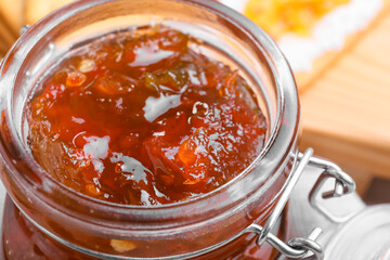 Jar with delicious jalapeno pepper jam, closeup