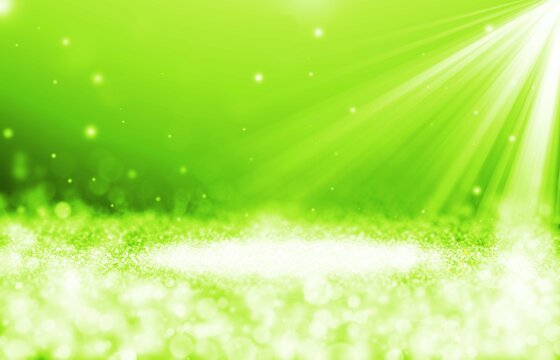 Green sparkle rays glitter lights with spotlight bokeh elegant show on stage abstract background. Dust sparks background.Spotlight background