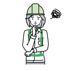 立って手をあごにあてて困っている工事現場の女性