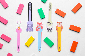 Cute bookmarks with blocks on light background