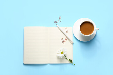 Obraz na płótnie Canvas Composition with notebook, stationery, cup of coffee and flower on color background