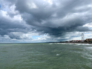 cloudy seascape, natural colors, empty beach