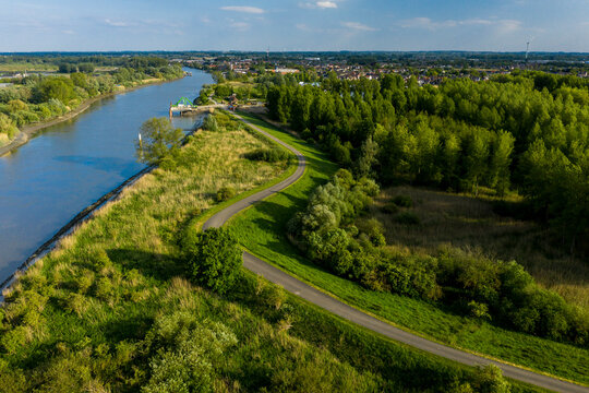Bike path along the Scheldt river, in Baasrode, East Flanders, Belgium