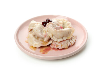 Plate with pierogi with cherry isolated on white background