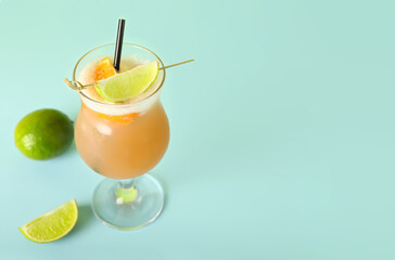 Glass of tasty whiskey sour cocktail on color background
