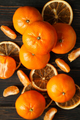 Group of tasty mandarins on rustic wooden background