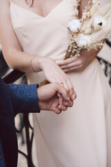 close-up photo. young couple hold hand. wedding day
