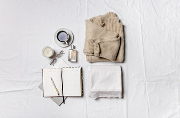 white dress, coffee and accessories on a white background. the concept of a stylish image