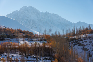 Beuatiful autumn season with fresh snow in Phander valley, Hindu Gush mountain range in Pakistan