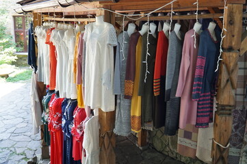 Sale of national Ukrainian clothing, embroidered dresses at the souvenir market in Yaremche.