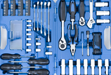 Set of metal tools for construction and repair close-up top view. Wrenches and other car service...