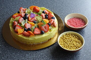 Fruit cake with decor on the table