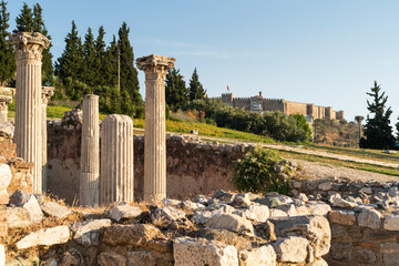 Ancient Roman pillars and Ayasuluk Castle in Selcuk city in summer season, Turkey