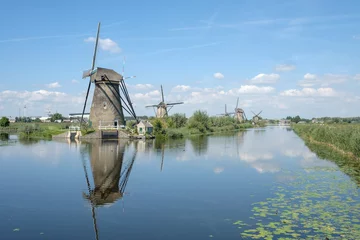 Fotobehang De molens van kinderdijk staan op de Werelderfgoedlijst van de UNESCO © Holland-PhotostockNL