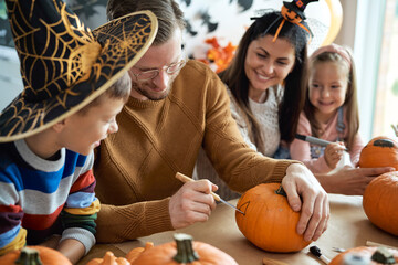 Happy family preparing to Halloween