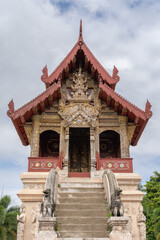 Vertical view of the facade of ancient Hor Trai library at famous landmark Wat Phra Singh buddhist temple, Chiang Mai, Thailand