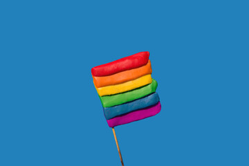 LGBT flag on a blue background. Isolated horizontal image.