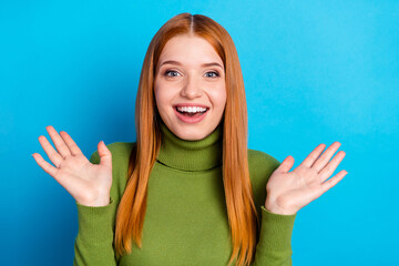 Photo portrait of young girl with red hair smiling amazed cheerful isolated on bright blue color background