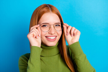 Photo of positive charming happy young woman wear glasses smile good mood isolated on blue color background