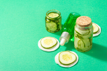 Homemade cucumber cosmetics. Detoxification skin vegetable masks. Natural face lotion, and tonic water