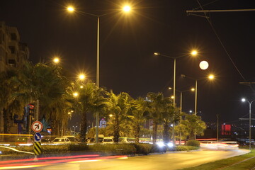 full moon and the city