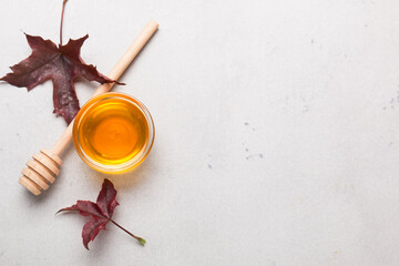 Honey or maple syrup in a bowl.
