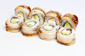 Traditional japanese nigiri sushi, separated on white background, side view