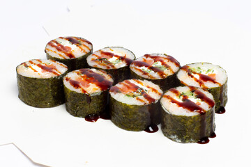 Traditional japanese nigiri sushi, separated on white background, side view