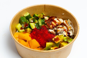Poke bowl with raw salmon, rice and vegetables on white background