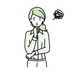 立って手をあごにあてて困っているブラウスの女性