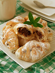 Filled mini croissants with chocolate.