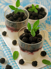 Fototapeta na wymiar Rice pudding and blackberries.