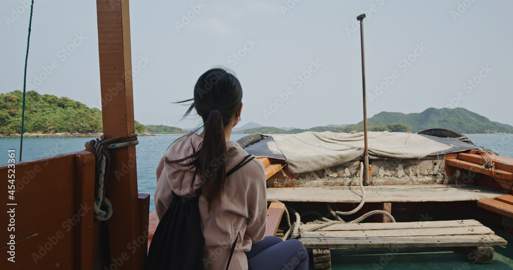 Sticker woman sit on the ship and move on sea