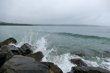 waves crashing on rocks